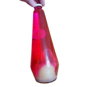 Small glass fuchsia pink lava lamp bulb! Bottom sits about 2 7/8s of an inch. 9
